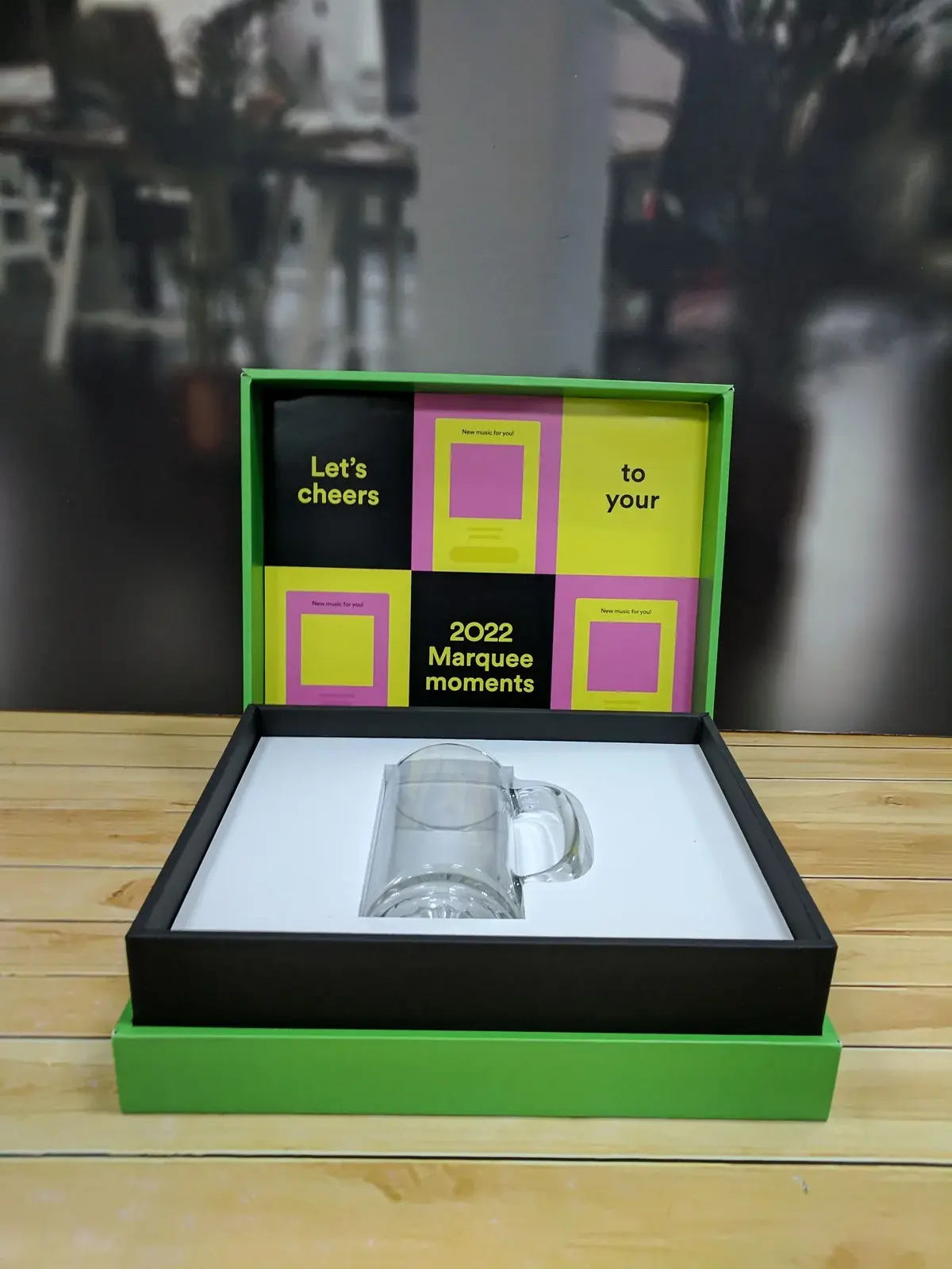 The Spotify for Artists appreciation box open on its printed lid, the gift seated in a molded white well inside a custom rigid box